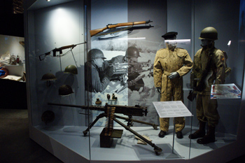 Photograph of uniforms at Bastogne War Museum.